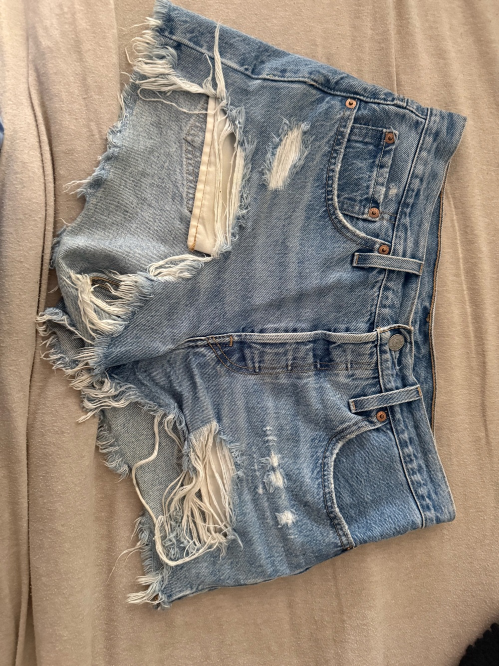 Levi's Distressed Light Blue Cutoff Jean Shorts